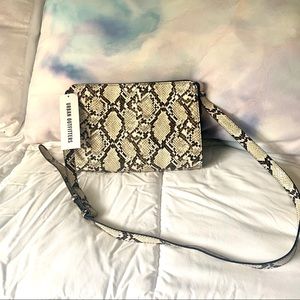 Urban Outfitters cross body or short strap purse